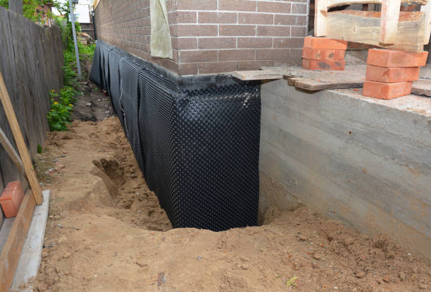 Happy homeowners after waterproofing job in Buckeystown